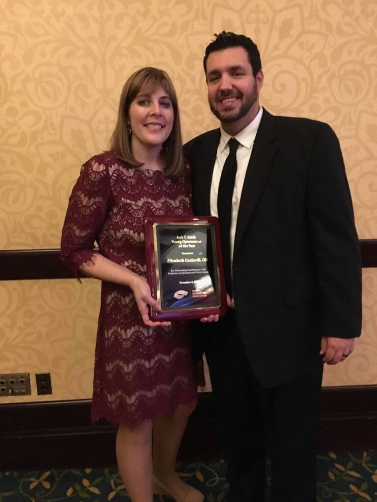 Dr. Cockerill receiving the Young Optometrist of the Year award